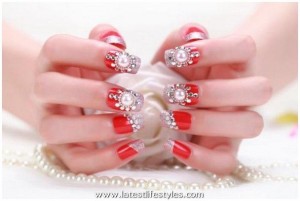 red nails with rhinestones