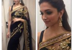 Deepika Padukon in party wear black and golden embroidered saree