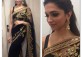 Deepika Padukon in party wear black and golden embroidered saree