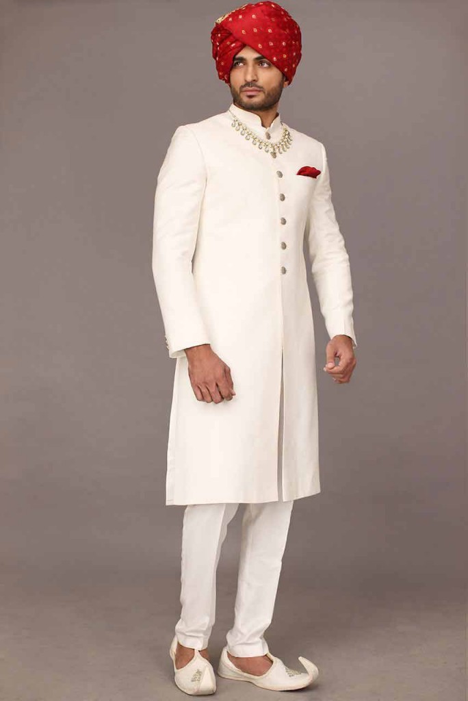 Pakistani Sherwani Designs In White color With Red Pagri