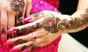 bridal arabic mehndi design with glitter and stones