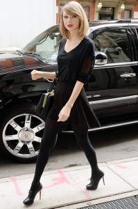 Taylor Swift in Black top with Short Skirt